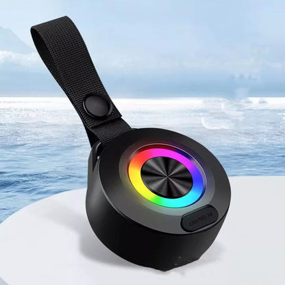 Portable Bluetooth speaker with colored lights and waterproof design