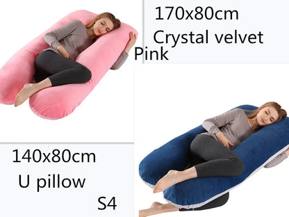 Large U-shaped pregnancy support pillow with removable cover and abdominal support belt.