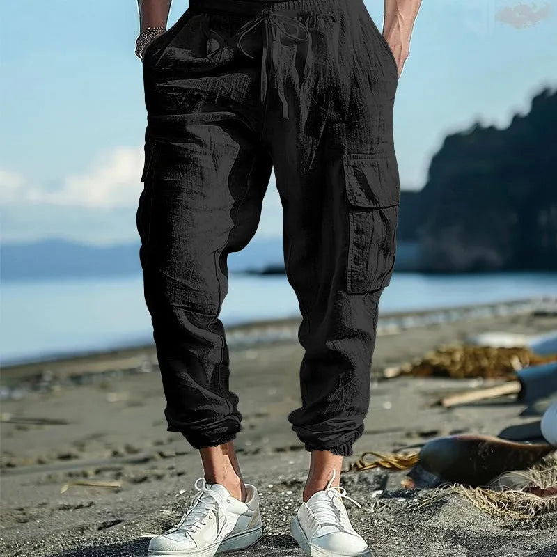 Men's linen trousers with ankle ties and multiple pockets in solid colour