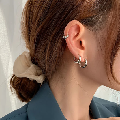 Women's retro minimalist water drop earrings in geometric round shape available in gold or silver colour with three size options