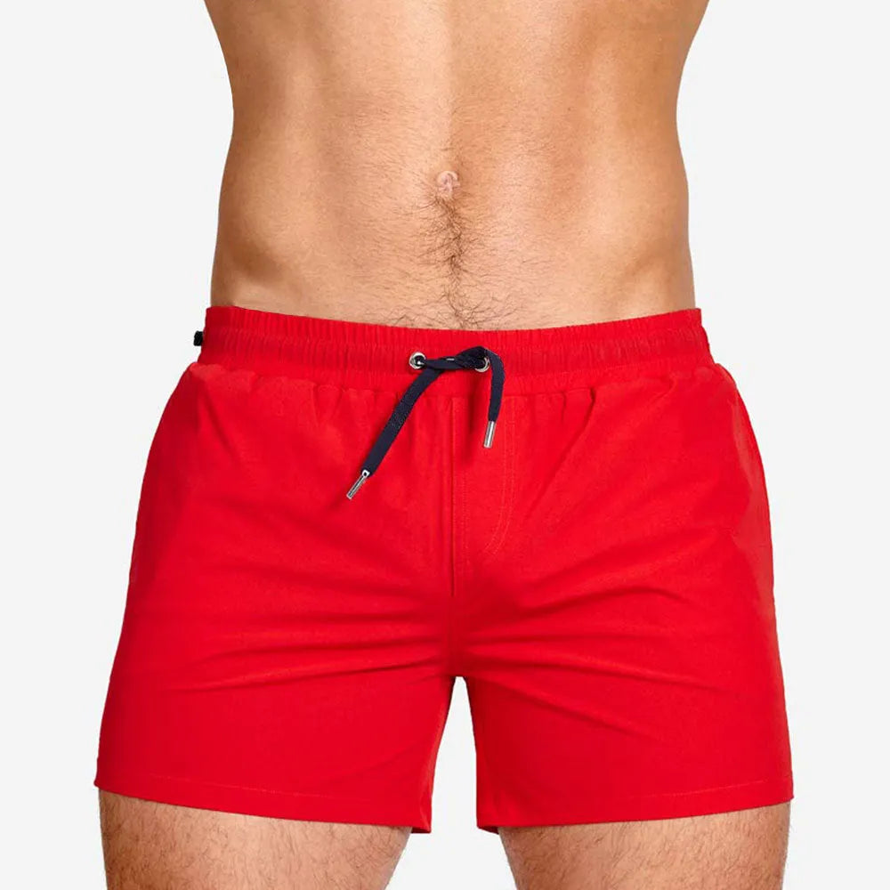 Athletic sports shorts in Army Green colour with visible mesh lining and elastic waistband with drawcord.