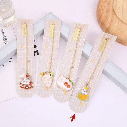 Jane Lime Foodie cat creative metal bookmark with cartoon pendant on a book page.