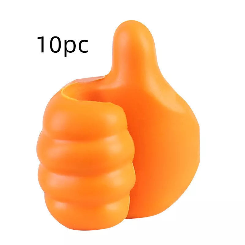 Silicone thumb wall hooks in various colors for organizing kitchen and bathroom items