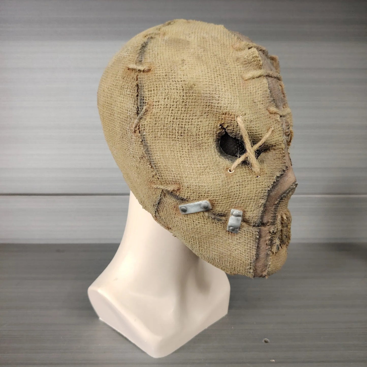 Latex Halloween horror mask with scar skull design measuring 31cm by 25cm for costume events