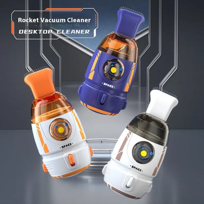 USB-powered handheld desktop vacuum cleaner in blue colour cleaning computer keyboard