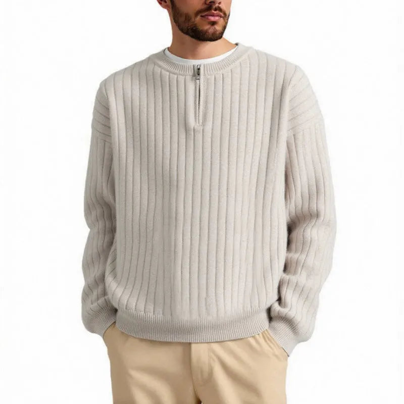 Men's grey half-zip pullover sweater with textured knit and loose fit, showing front view with zip partly open.