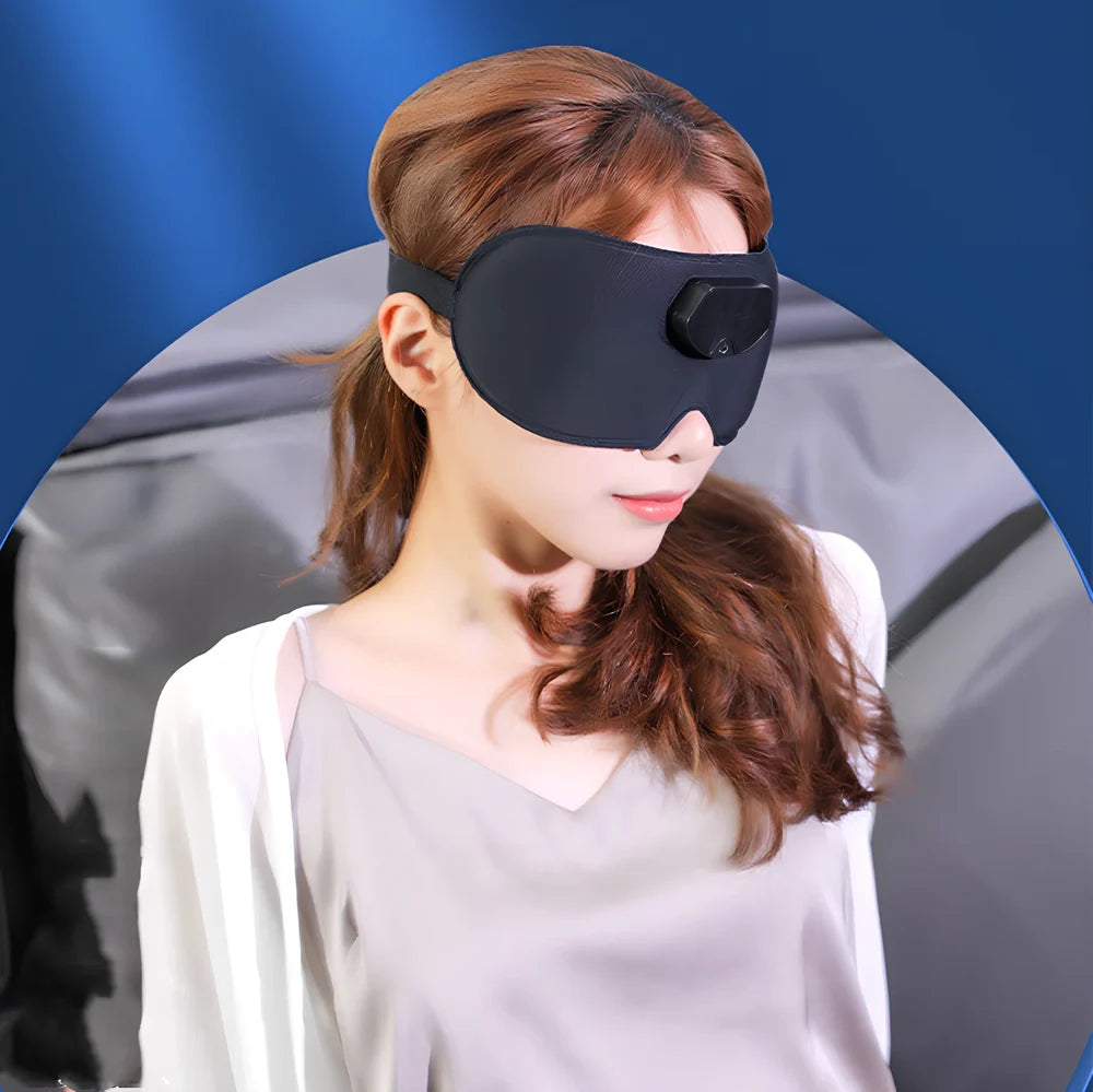 Black smart eye massager with micro-current technology and USB charging cable