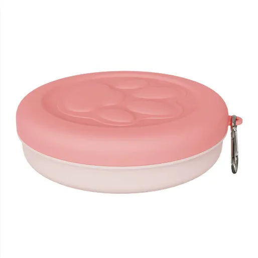 Collapsible portable dog bowl with snack compartment in light pink and green colour options