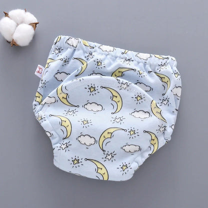 Washable baby training pants with 6-layer gauze construction in pure cotton, showing five colour options