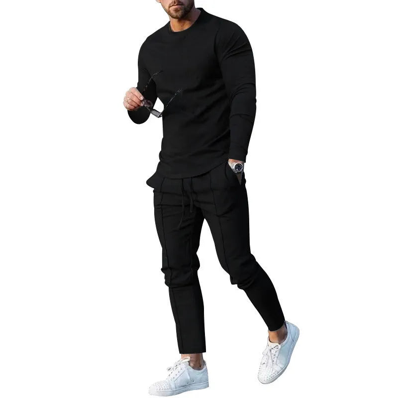 Men's light grey polyester two-piece suit set with long sleeve round neck T-shirt and matching trousers.
