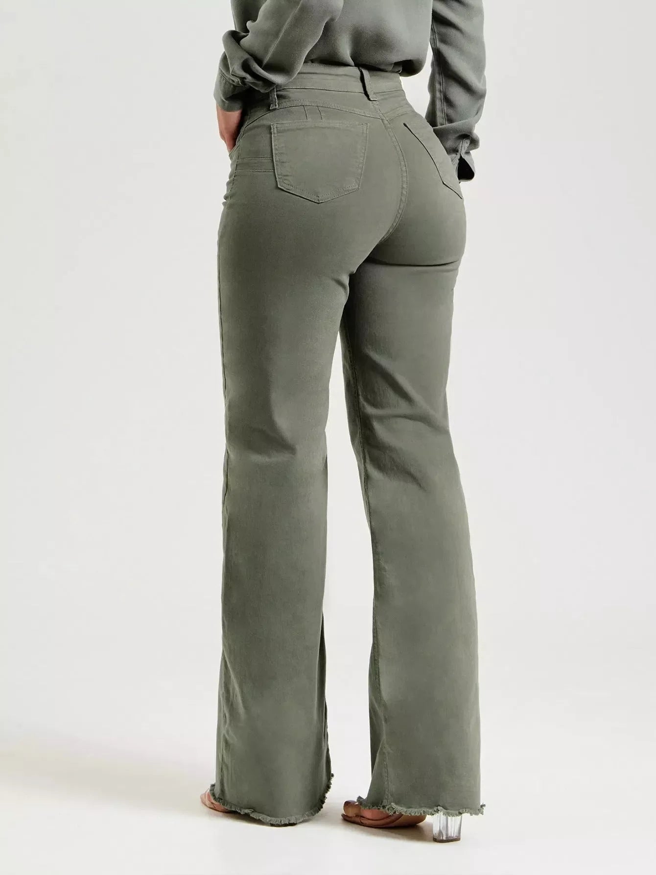 Slim fit stretch denim flared pants in olive green with micro flared design and zipper detail