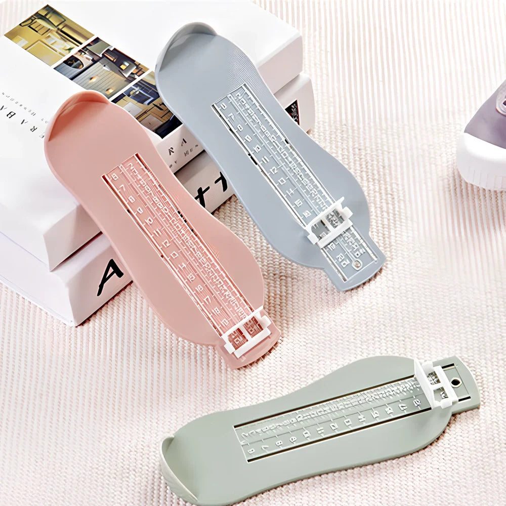 Blue children's foot measuring ruler with 0-20cm scale on ABS plastic 22.7x9x2.5cm