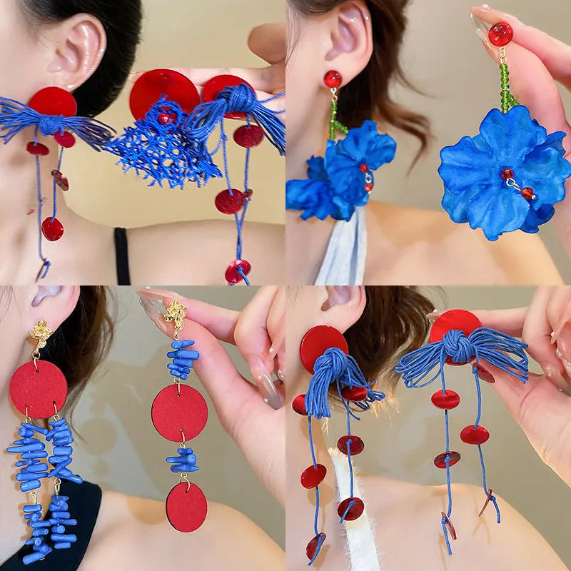 Geometric blue cloth women's earrings with round elements and a handcrafted finish.