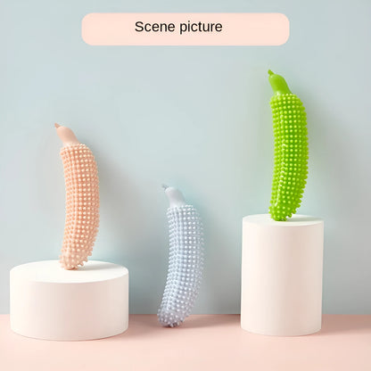 Green, pink, and purple cucumber-shaped durable dog chew toy for teething and training.