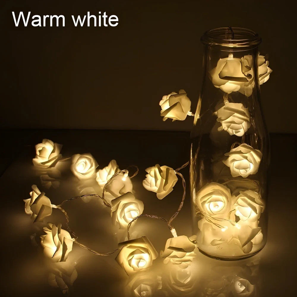 3-metre long battery-powered LED floral string lights with 20 white floral units on green plastic stems