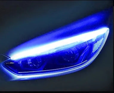 Car LED daytime running light strip with flowing turn signal function in silicone housing