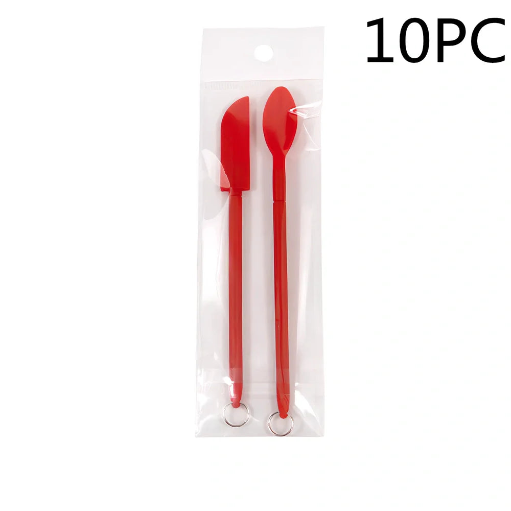 Retractable silicone cosmetic spatula extended to 15cm with scraper tool for product application