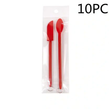 Retractable silicone cosmetic spatula extended to 15cm with scraper tool for product application