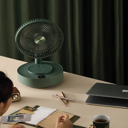 Green and white storage floor electric fan extended to vertical position with remote control