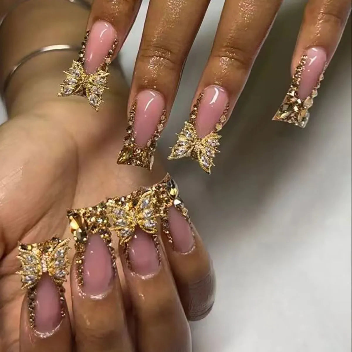 Golden Diamond In The Debris Butterfly patterned nail stickers and jelly glue tube.