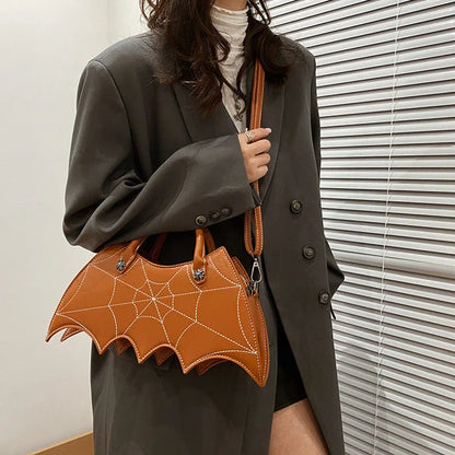 Stylish Halloween spider web crossbody bag in various colors, including black, white, brown, pink, and purple