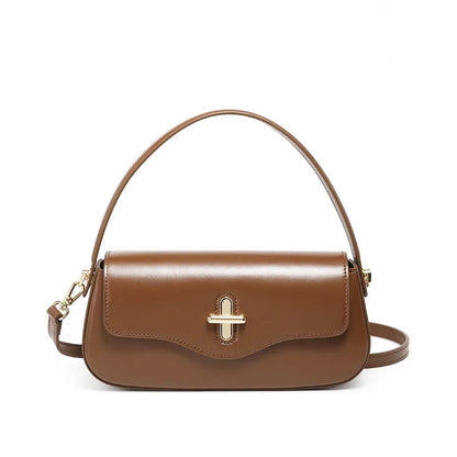 Genuine leather baguette handbag in clamshell design with internal organiser compartments