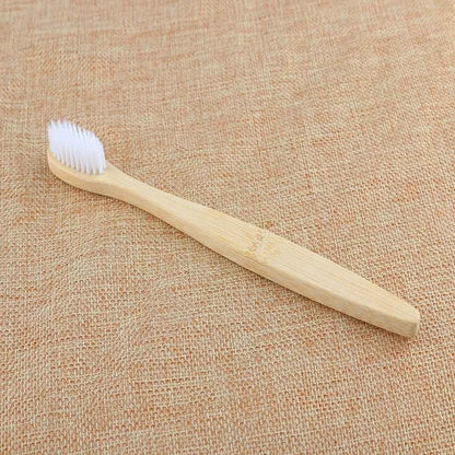 Organic bamboo toothbrush with 17.5cm ergonomic handle and charcoal-infused bristles for sustainable dental care