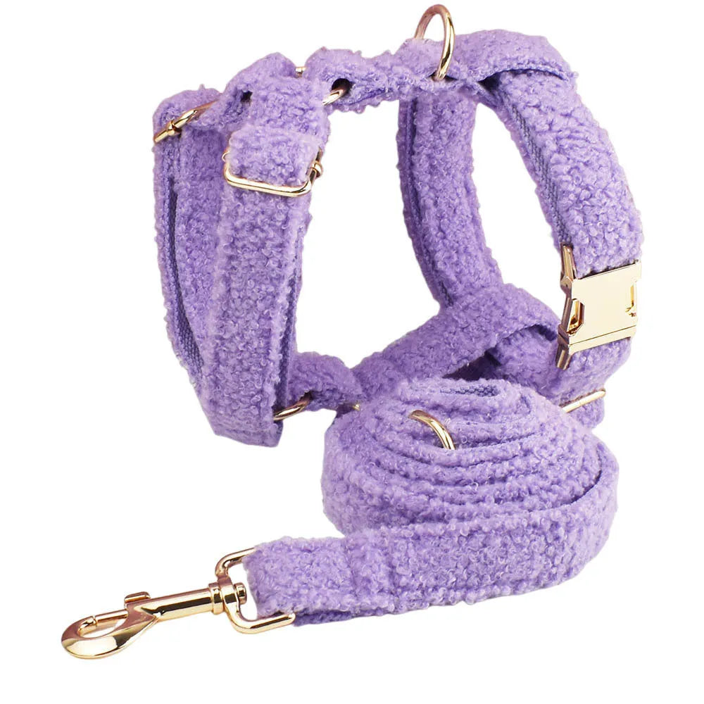 Cloth dog accessory set showing collar, leash, bow, and vest in coordinating fabric