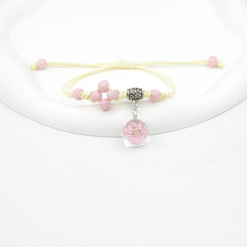 Glass dried flower bracelet with real flower and lace flower details, handmade woven construction with large bead diameter of 1.4 cm, available in thirteen colour options including white, red, pink, and blue for women's jewellery and accessories.