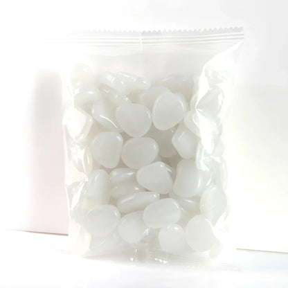 Blue, green, and white glow in the dark resin rocks for aquarium decoration with irregular shapes