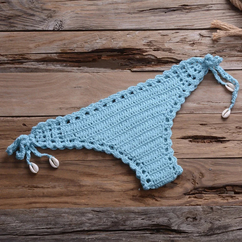 Two-piece bikini set in cotton-blend fabric with acrylic, showing jacket and pants in various colours like khaki and light blue