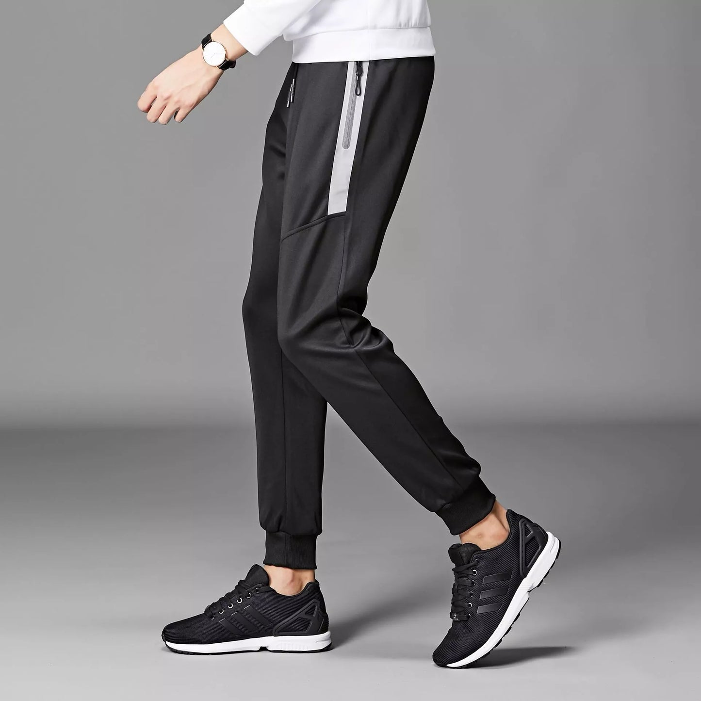 Men's winter sports pants in black and grey, made with South Korean silk fabric for warmth and flexibility