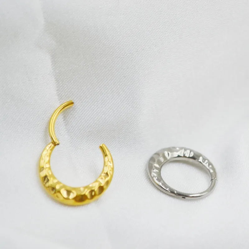 Titanium alloy concave-convex nose ring ASTM F136 unisex body jewellery with carved design available in gold and silver colours with 1.2mm thickness and 8mm or 10mm diameter for smooth insertion and secure fit