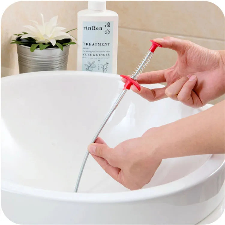 Stainless steel sewer dredge spring drain cleaning tool with a black PP handle.