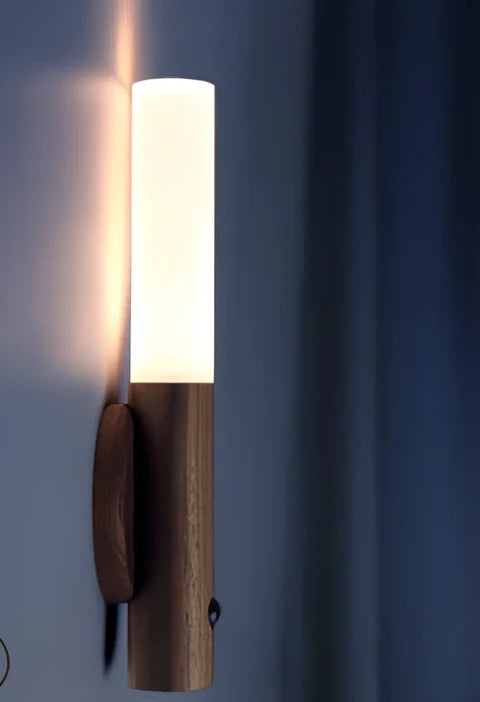 Induction night light with motion sensor and LED illumination measuring 80x43x210mm