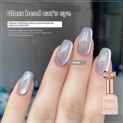 Bottle of micro glass bead cat's eye gel nail polish for magnetic nail art.