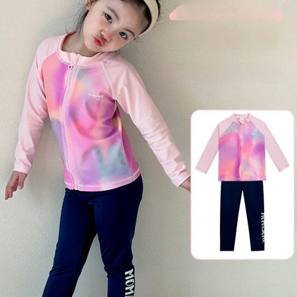 Girls' long sleeve swimsuit with split skirt in gradually varied pink colour, showing complete arm coverage and skirt design