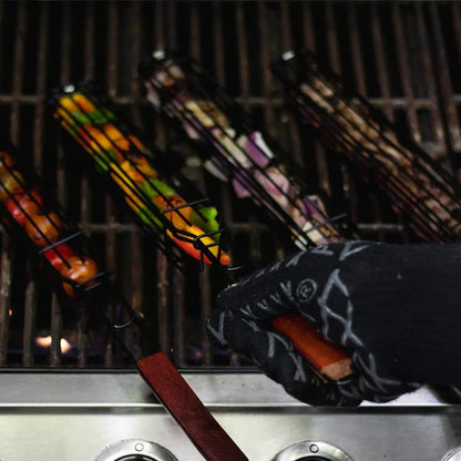 Barbecue basket with rotary lid and long wood handle on a grill, burlywood colour.