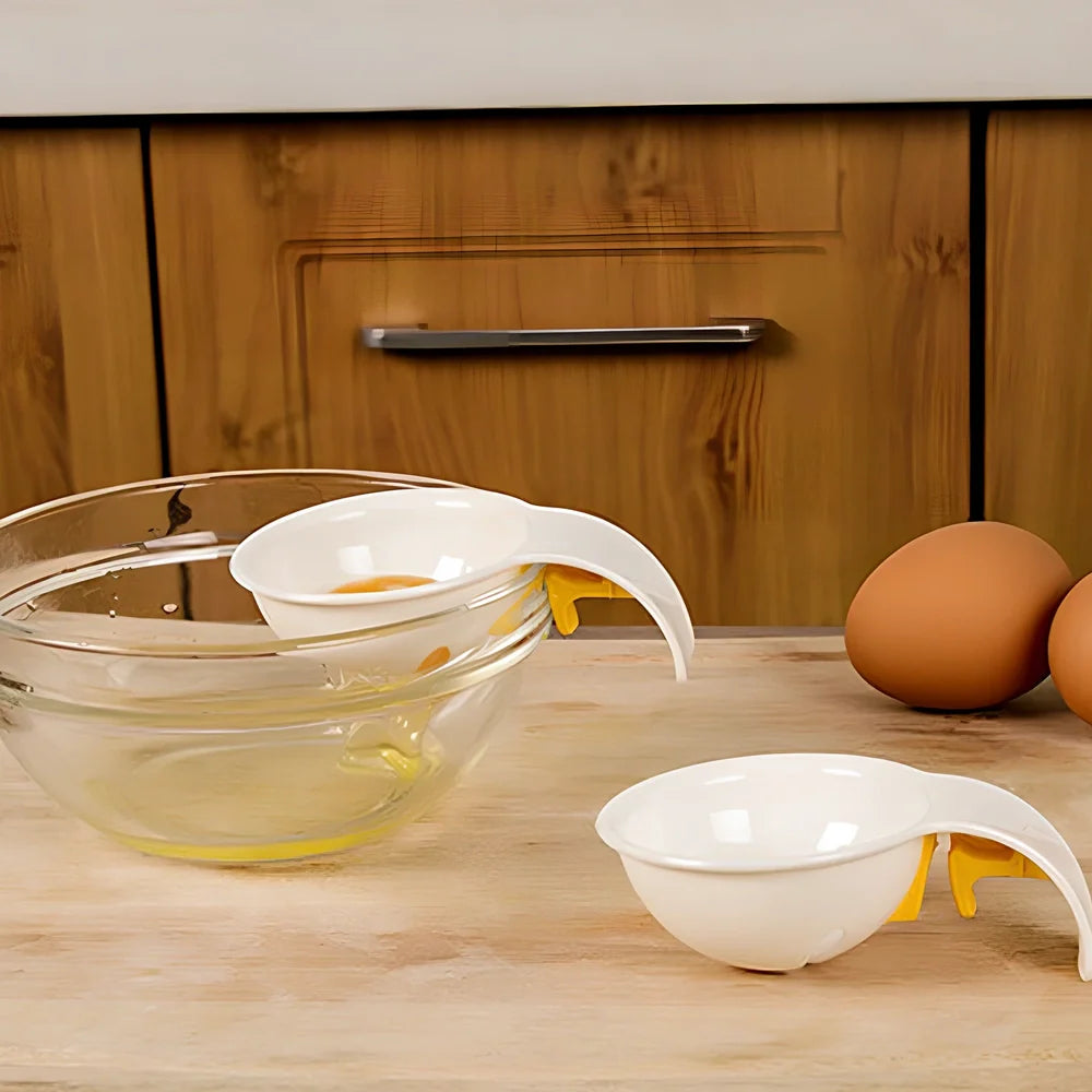 White ABS plastic egg separator with 10cm handle and 7.3cm bowl for yolk separation