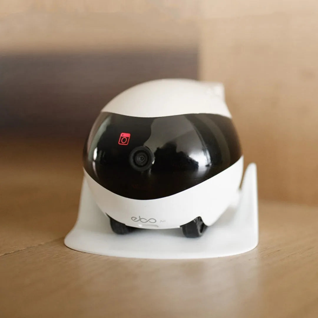 Smart home mobile surveillance robot camera with compact design and automatic docking station