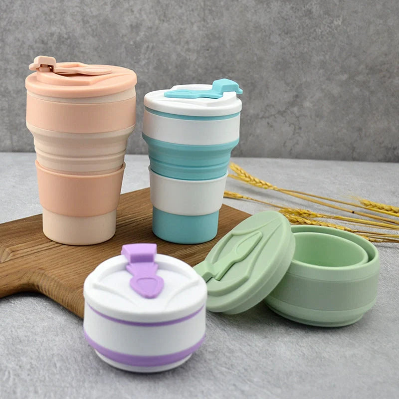 Collapsible silicone travel mug with leak-proof cover in various colors