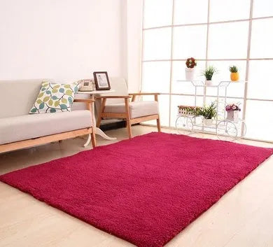 Solid colour plush area rug showing velvet pile texture and rectangular shape