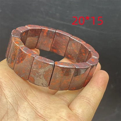 Bloodstone meteorite bracelet in quartz rock jade with traditional pendant options on wrist