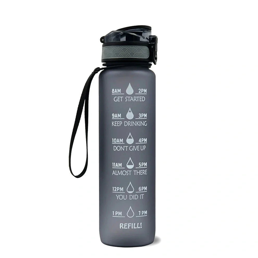 Tritan sports water bottle with frosted gradient finish and flip-top lid showing blue-red colour transition