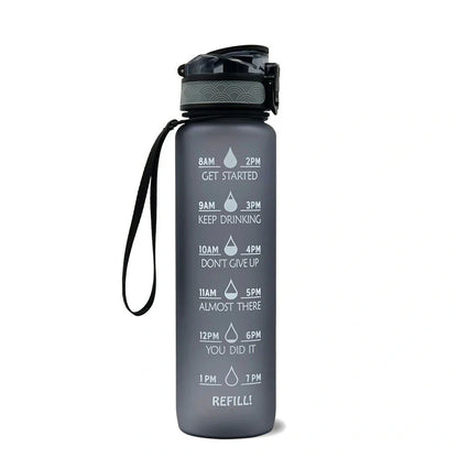 Tritan sports water bottle with frosted gradient finish and flip-top lid showing blue-red colour transition