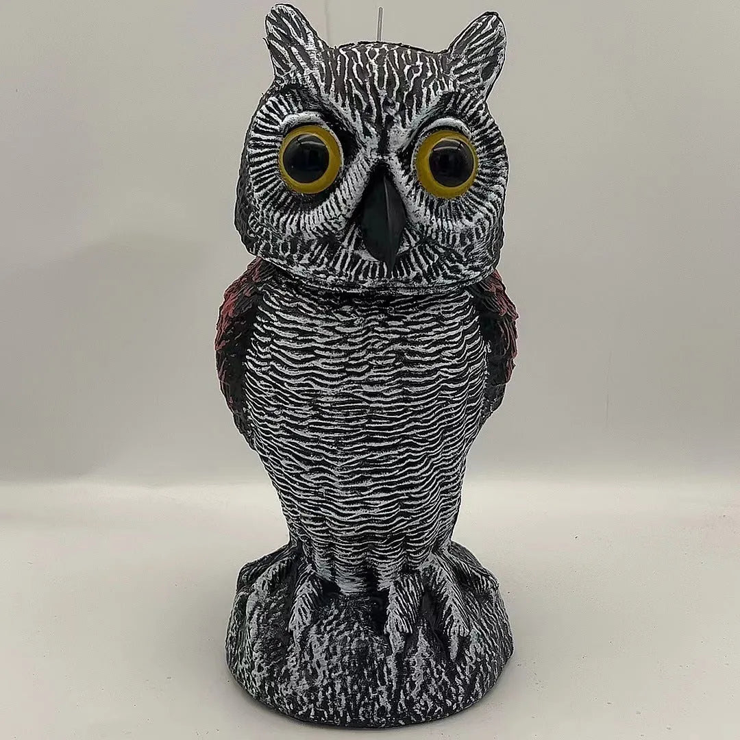 Set of artificial owl bait ornaments with shaking heads for scaring birds outdoors.