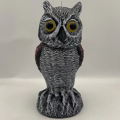 Set of artificial owl bait ornaments with shaking heads for scaring birds outdoors.