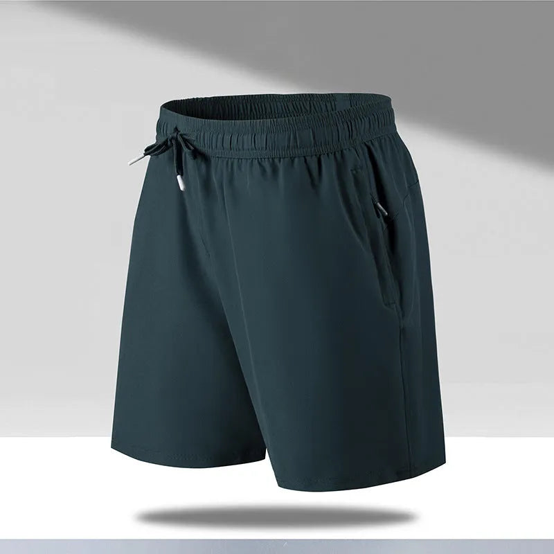 Man wearing black loose-fit ice silk sports shorts with a micro-elastic waistband, suitable for running or casual summer wear.