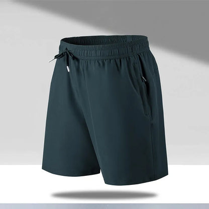 Man wearing black loose-fit ice silk sports shorts with a micro-elastic waistband, suitable for running or casual summer wear.