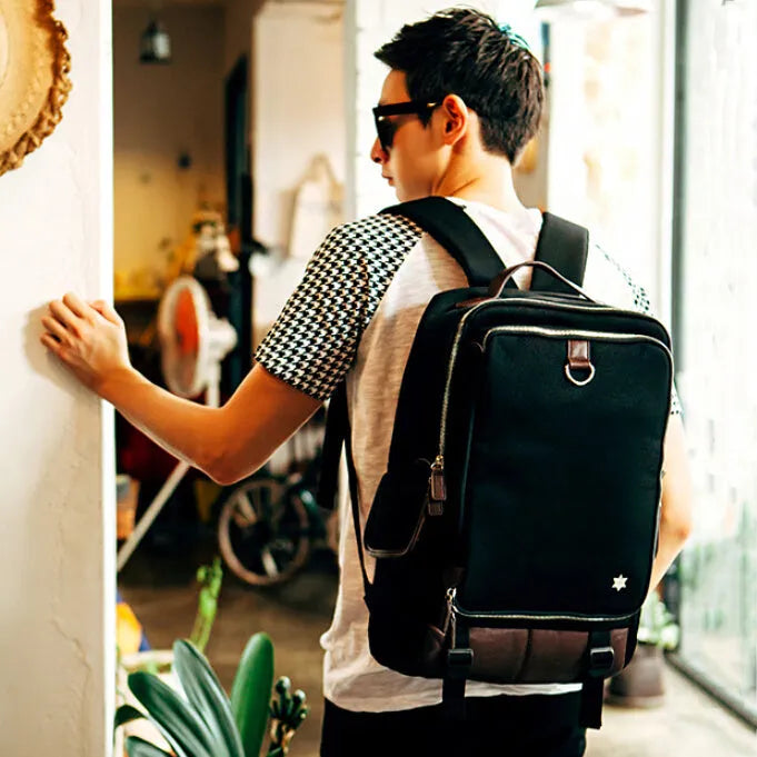 Modern large capacity Oxford cloth backpack in grey, showing front view with dimensions 30x16x46cm.